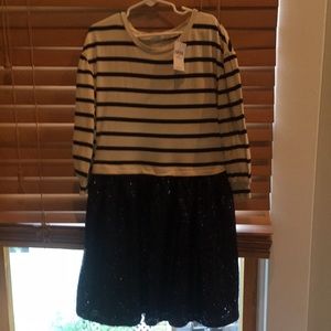 New with tags GAP dress. Sequined bottom